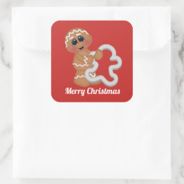 Banhando pão de Natal adiciona adesivo de mensagem