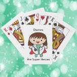Baralho Médicos Super Herói Mulher Funny Kawaii<br><div class="desc">Você tem uma médica trabalhadora duro na sua vida? Diga-lhe que ela é apreciada! Estas cartas de jogar têm uma foto de uma mulher médica em um casaco de laboratório,  esfregões e um estetoscópio além de uma capa de super-herói! O texto diz: "Médicos são Super Heróis".</div>