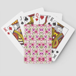 Baralho Two images showing playing cards with a floral 