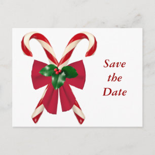 Bastões de doces cruzados com cartão do arco