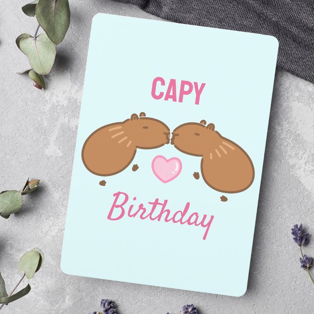 Beijar Cartão de Aniversário do Casal Capybara (Wishing a happy birthday with animal pun art featuring two kissing capybaras and love.)