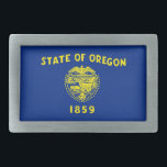 Belt Buckle com bandeira do Estado de Oregon<br><div class="desc">Elevem seu jogo acessório com uma nota ousada: nossa fivela de cinto com a bandeira de Oregon! Esta fivela de cinto apanhadora de olhos é mais do que apenas um item funcional; é um na moda tributo à herança do Oregon e uma forma distinta de mostrar o seu orgulho estatal....</div>