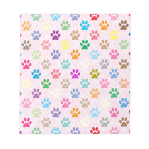 Bloco De Notas A pata colorida do filhote de cachorro imprime o