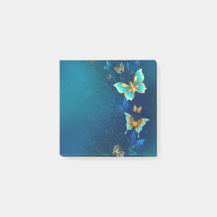 Bloco De Notas Borboletas de ouro em um fundo azul