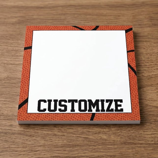 Bloco de notas de nome da equipe de basquetebol pe (Custom basketball notepad on desk.)
