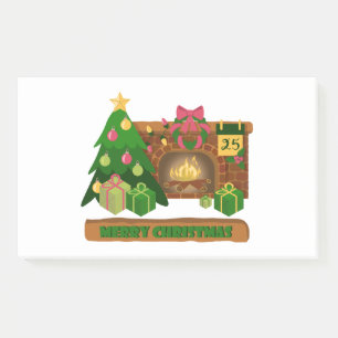 Bloco De Notas Feliz Natal perto da árvore de Natal de lareira bo