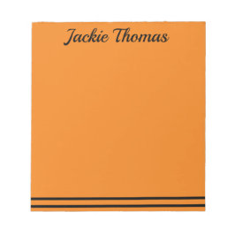 Bloco de notas laranja e preto