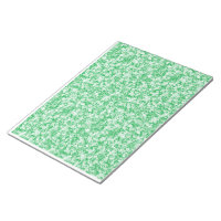 um fundo verde e branco com pequenos pontos branco