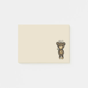 Bloco De Notas Urso castanho-branco segurando uma flor amarela