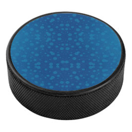 Blue circular product with a polka dot pattern 