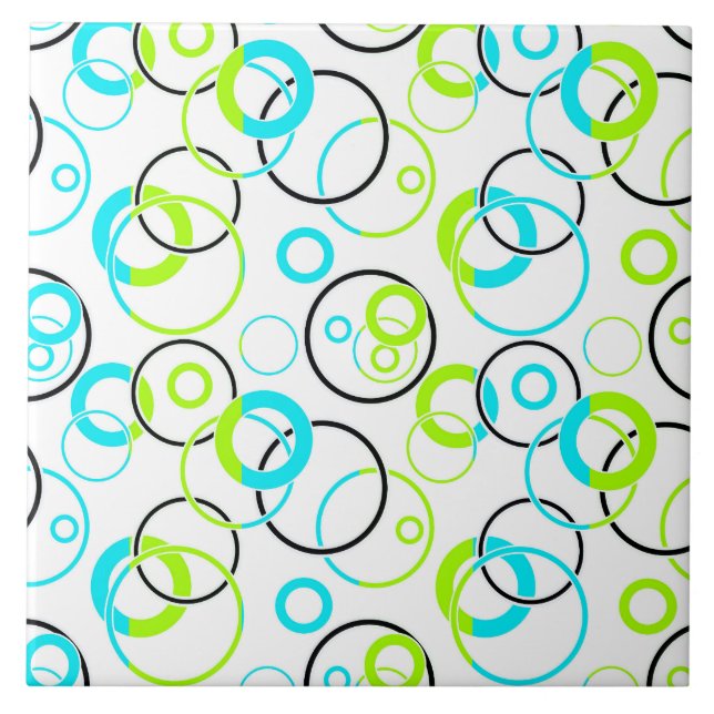 blue green and black rings and circles on white  (Frente)