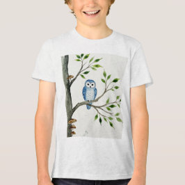 Blue owl on a tree branch