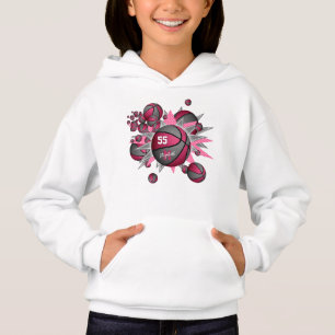bola de basquete de cinza rosa da menina desportiv