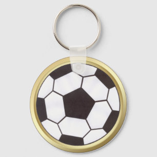 Bola de futebol com chaveiro de ouro