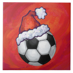 Bola de futebol do chapéu do papai noel no