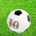 Bola De Futebol Sigla em branco do monograma preto dourado, número<br><div class="desc">Um fundo branco na moda,  preto e ouro. Personalize e adicione seu nome e número de jogador. As suas iniciais do monograma como padrão de fundo.</div>