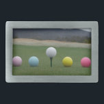 Bolas de Golfe de cor brilhante em uma montanha<br><div class="desc">Bolas de Golfe cor-de-rosa amarelo e azul,  brancas e brilhantes num campo de golfe na montanha Foto de Sandy Closs,  tirada no lago Arrohead. Golfe,  golfe,  golfe,  "cobarde de golfe",  primavera,  "esportes",  páscoa,  feriado,  "ovo de páscoa" rosa,  , amarelo-golfe</div>