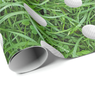 Bolas de golfe no papel de embrulho de grama de 45
