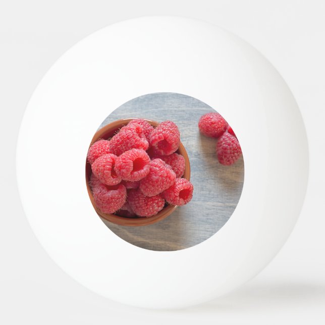Bolinha De Ping Pong Fresh raspberries in a bowl (Verso)