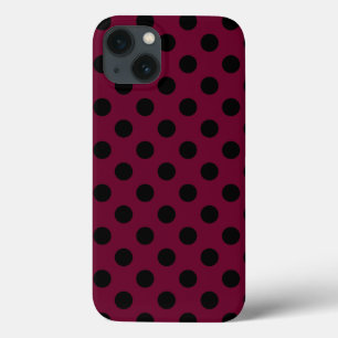 Bolinhas negras sobre capas de iphone de gabinete