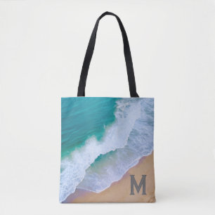 Bolsa de mão com design de onda do mar e monograma