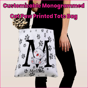 Bolsa de mão com estampa de pata de gato monogramá