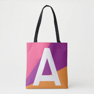 Bolsa de mão com monograma e bloco de cores retrô