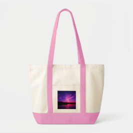 Bolsa de mão cor-de-rosa com imagem do pôr do sol