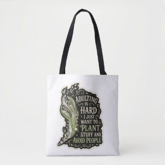 Bolsa de mão em bordado verde com estética botânic