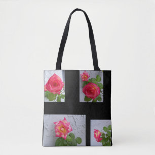 Bolsa de mão em lona preta com estampa de rosas