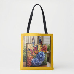 Bolsa de mão média com estampa total mais tendênci