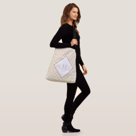Bolsa de mão superdimensionada com padrão creme e
