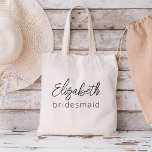 Bolsa Tote Bachelorette de Script Minimalista Moderna Bridesm<br><div class="desc">Eleve sua festa de solteira com nossa coleção "Script Minimalista Moderno da Bridesmaid". Esta linha requintada de produtos incorpora elegância contemporânea e estilo de eterno, perfeita para celebrar seus futuros núpcias de uma forma moderna e sofisticada. Nosso design de script minimalista coloca suas madrinhas na frente, adicionando um toque de...</div>