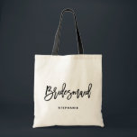 Bolsa Tote Black Hand Lettering Bridesmaid I Personalized<br><div class="desc">Customizable bridesmaid tote bag. Modern and classic tote bag featuring black "bridesmaid" hand lettering script. Personalize by adding the receiver's name,  the hashtag of the wedding or other details. Perfect as a gift for your wedding party or bridal party.</div>
