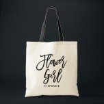 Bolsa Tote Black Hand Lettering Flower Girl Personalizadas<br><div class="desc">Saco de tote de uma florista personalizável. Saco de tota moderno e clássico,  com um guião preto de "floricultura". Personalize adicionando o nome do receptor,  a hashtag do casamento ou outros detalhes. Perfeito como presente para sua festa de casamento ou festa noiva.</div>