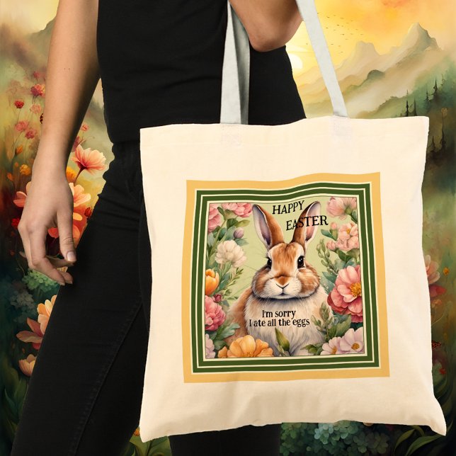Bolsa Tote Caçada De Ovo De Coelhinho Engraçado (A funny tote bag featuring a fat bunny embraced by flowers. Beautiful for an Easter egg hunt.)