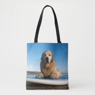 Bolsa Tote Cão do golden retriever que coloca em um conselho
