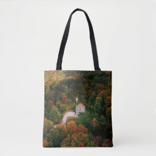 BOLSA TOTE CASA BRANCA E COROA ARREDONDADA POR ÁRVORES