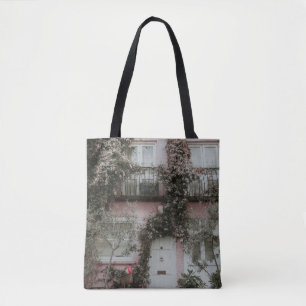 BOLSA TOTE CASA PINTA E BRANCA COBERTA POR PLANTAS A