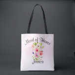 Bolsa Tote Casamento de Madrinhas de casamento de Buquê das F<br><div class="desc">Este bolsa bonito é o saco perfeito para agradecer a sua madrinha de casamento pelo seu fazer de trabalho duro no seu dia de casamento especial. Ele apresenta um belo buquê de aquarela de flores silvestres, picos ou violetas em um fundo rosa pálido. A legenda no topo diz: Madrinha de...</div>