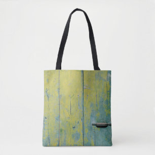 Bolsa Tote Closeup photo of yellow and teal wooden board