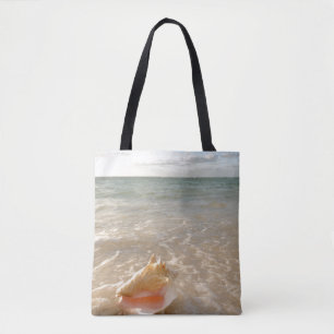 Bolsa Tote Conch Shell na areia na praia tropical