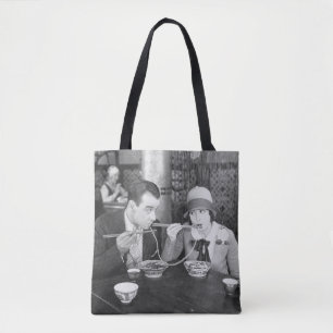 Bolsa Tote Couple sharing a noodle in a restaurantvintage, fo