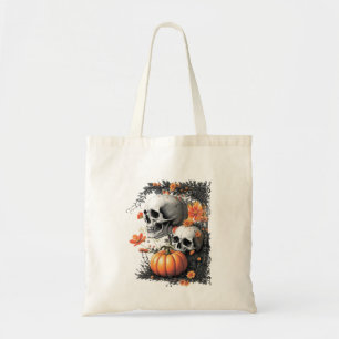Bolsa Tote Dois crânios e uma abóbora entre flores.