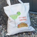 Bolsa Tote É terça-feira em algum lugar Taco e Margarita Tequ<br><div class="desc">Esta bolsa de tote apresenta uma pintura aquosa de um vidro margarita e taco. Personalize com suas informações e altere qualquer texto para se adequar ao seu estilo.</div>