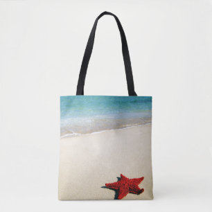 Bolsa Tote Estrela do mar vermelha na praia branca da areia