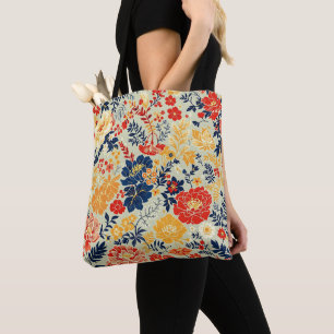 Bolsa Tote Flora vibrante vermelha, amarela e azul sobre o br