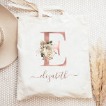 Bolsa Tote Floral Ivory Rosa Dourado Monograma - Letra E<br><div class="desc">Este saco elegante apresenta uma grande letra "E" monograma em folha de ouro falso rosa, decorada com um buquê floral de marfim vintage, aparado com folhagem de ouro verde e rosa. Personalize-o com seu nome no guião rosa gold, com florescimento no início e no fim. Faz um presente perfeito para...</div>