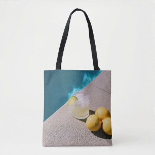 Bolsa Tote Frutas redondas amarelas na mesa da cinza