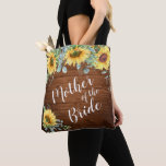 Bolsa Tote Girassóis Eucalipto Mãe Rústica da Noiva<br><div class="desc">Girassóis Eucalyptus Rustic roteiro "mãe do noivo" e nome personalizado no verso, elegante e romântico, presentes personalizados do excelente para a mãe do noivo. Para mais personalização, clique no link "personalizar mais" e use nossa ferramenta design para modificar esse modelo. Se precisar de ajuda ou itens correspondentes, entre em contato...</div>